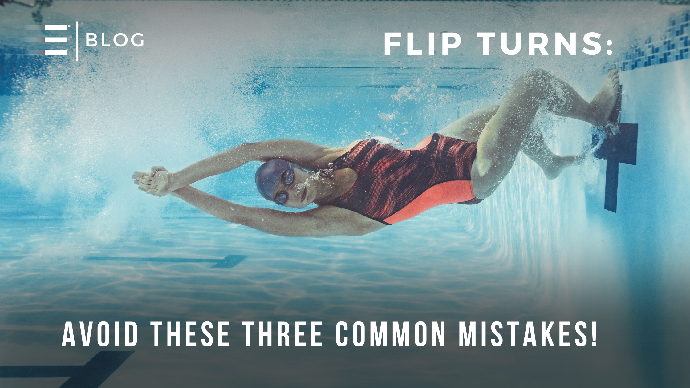 Female swimmer executing a flip turn underwater. Learn how to perfect your flip turns and avoid these 3 common mistakes with our expert guide: 'Flip Turns: Avoid These 3 Mistakes.